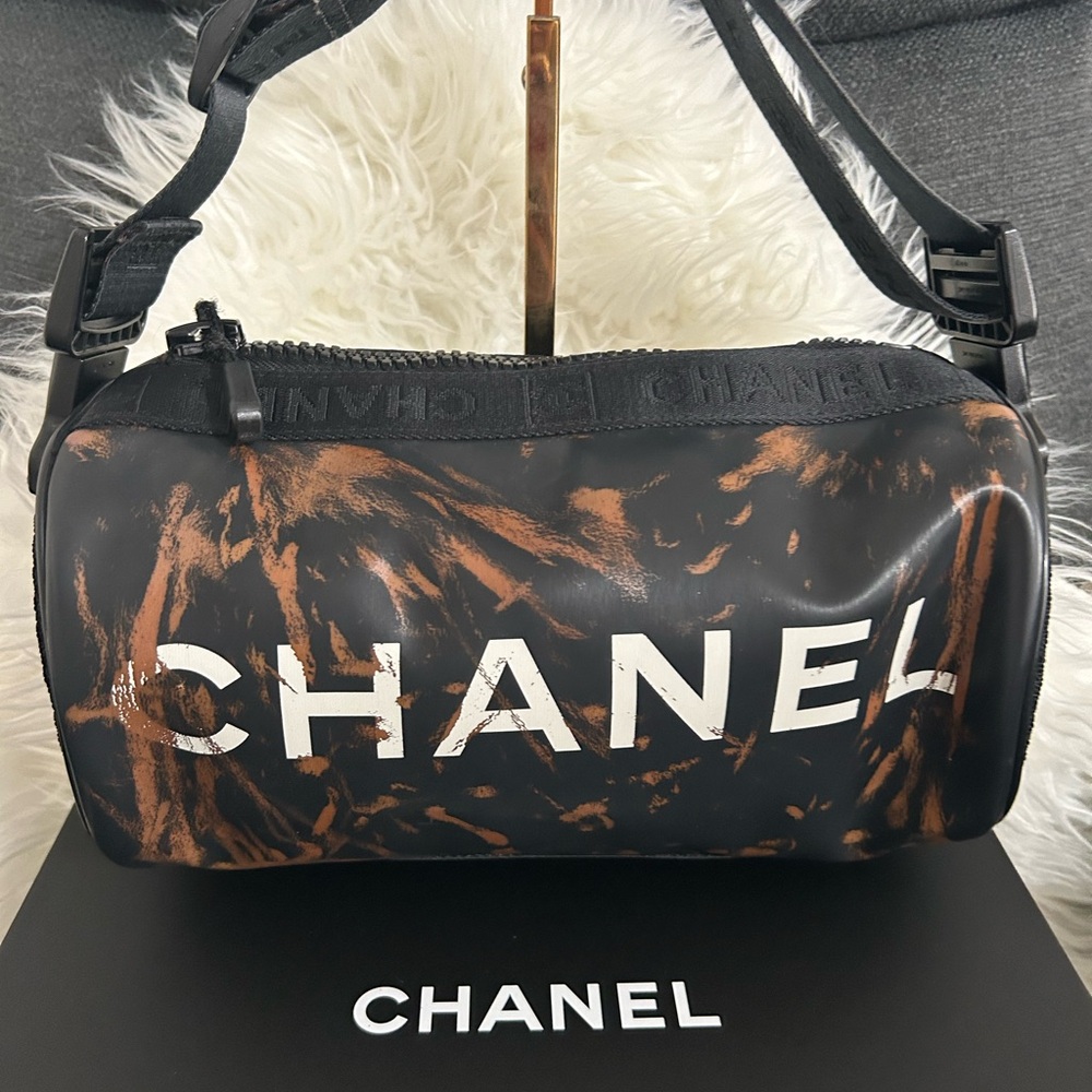 CHANEL Black and Brown Duffel Bag with Striking Design